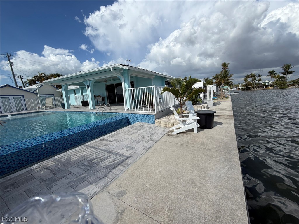 4743 Pine Island Road Matlacha, FL 33993 - Photo 10 of 34 a view of a house with patio