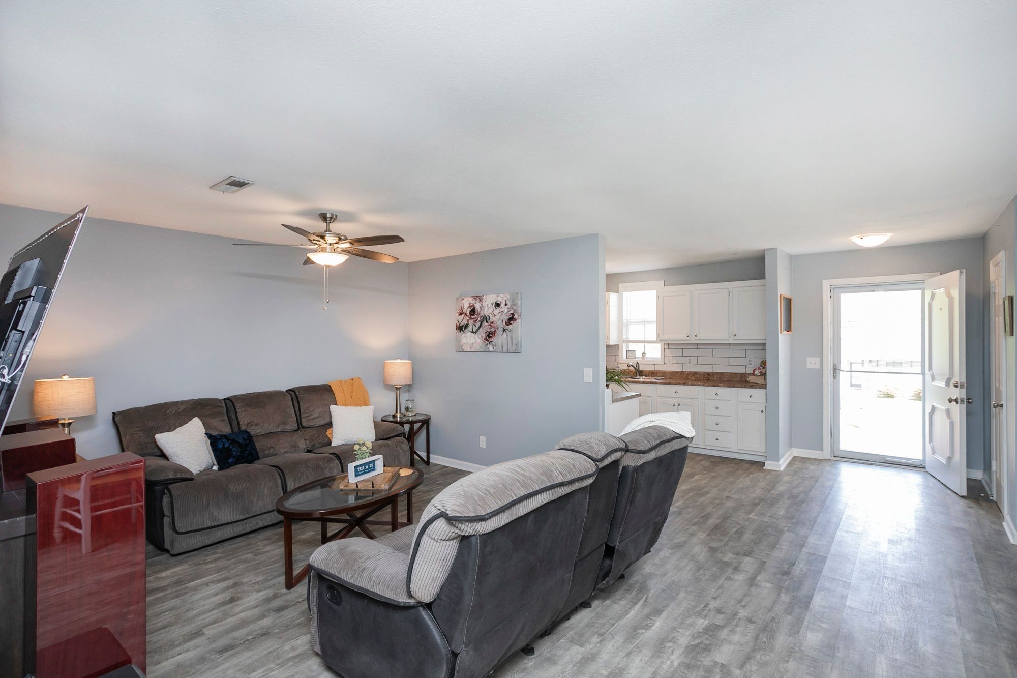 216 Warrior Road Madison, TN 37115 - Photo 20 of 37 a living room with furniture and a wooden floor