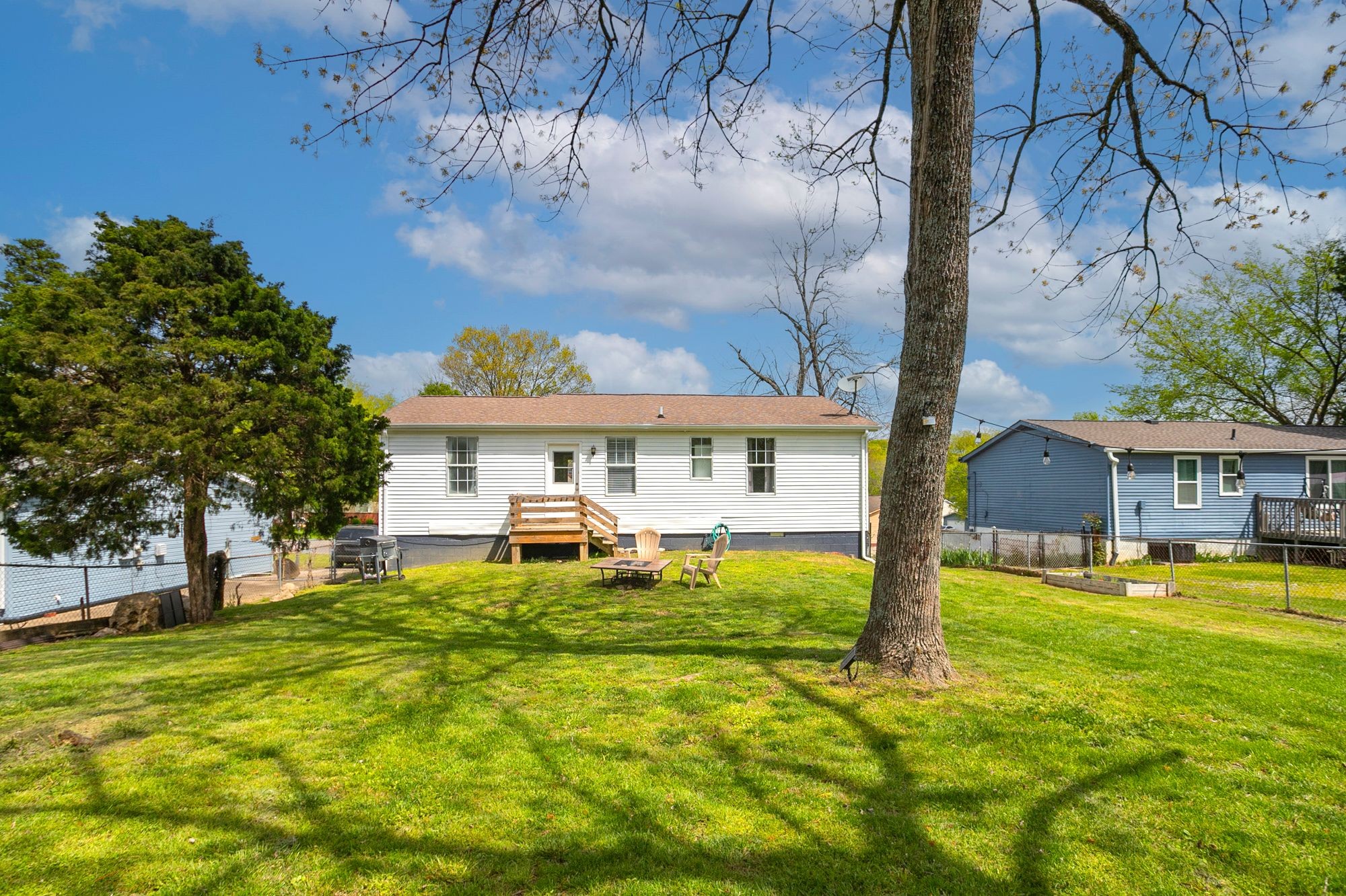 216 Warrior Road Madison, TN 37115 - Photo 34 of 37 a view of a house with a big yard and large tree