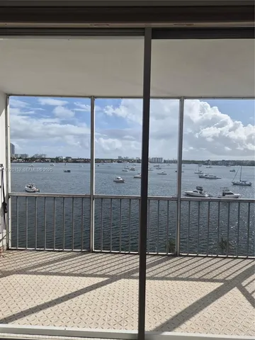 a view of a balcony with city view