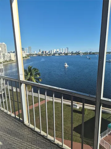 a view of a lake with a city view