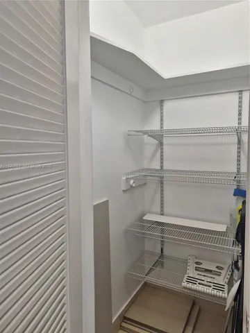 a sign that is sitting in front of a building