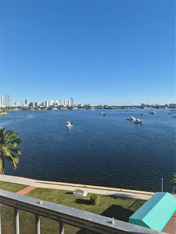 a view of a swimming pool with a terrace