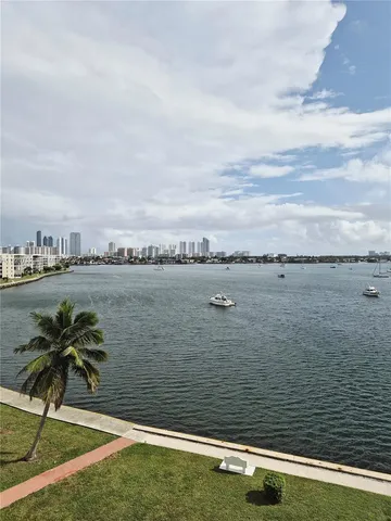 a view of balcony with yard