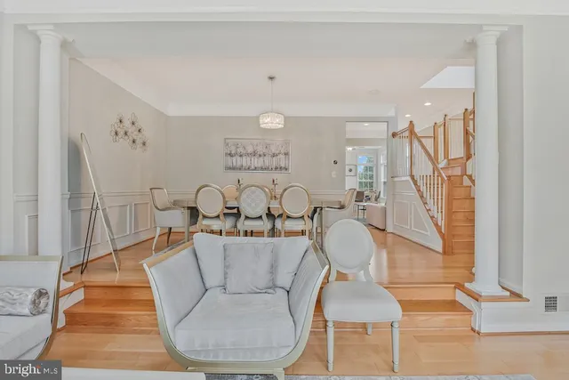 a living room with furniture and white walls