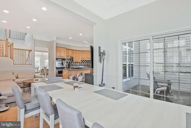 a large kitchen with lots of counter space a sink and appliances