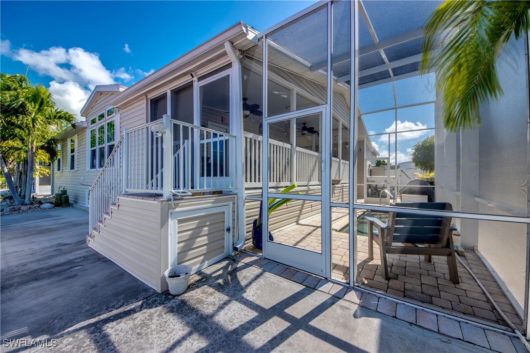 3083 Sloop Lane St. James City, FL 33956 - Photo 33 of 41 a view of a house with backyard and sitting area
