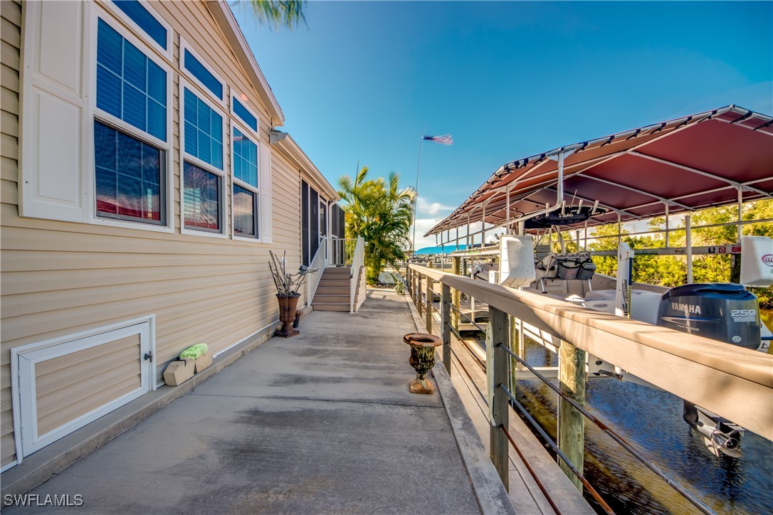 3083 Sloop Lane St. James City, FL 33956 - Photo 36 of 41 a view of an chairs and table in the balcony