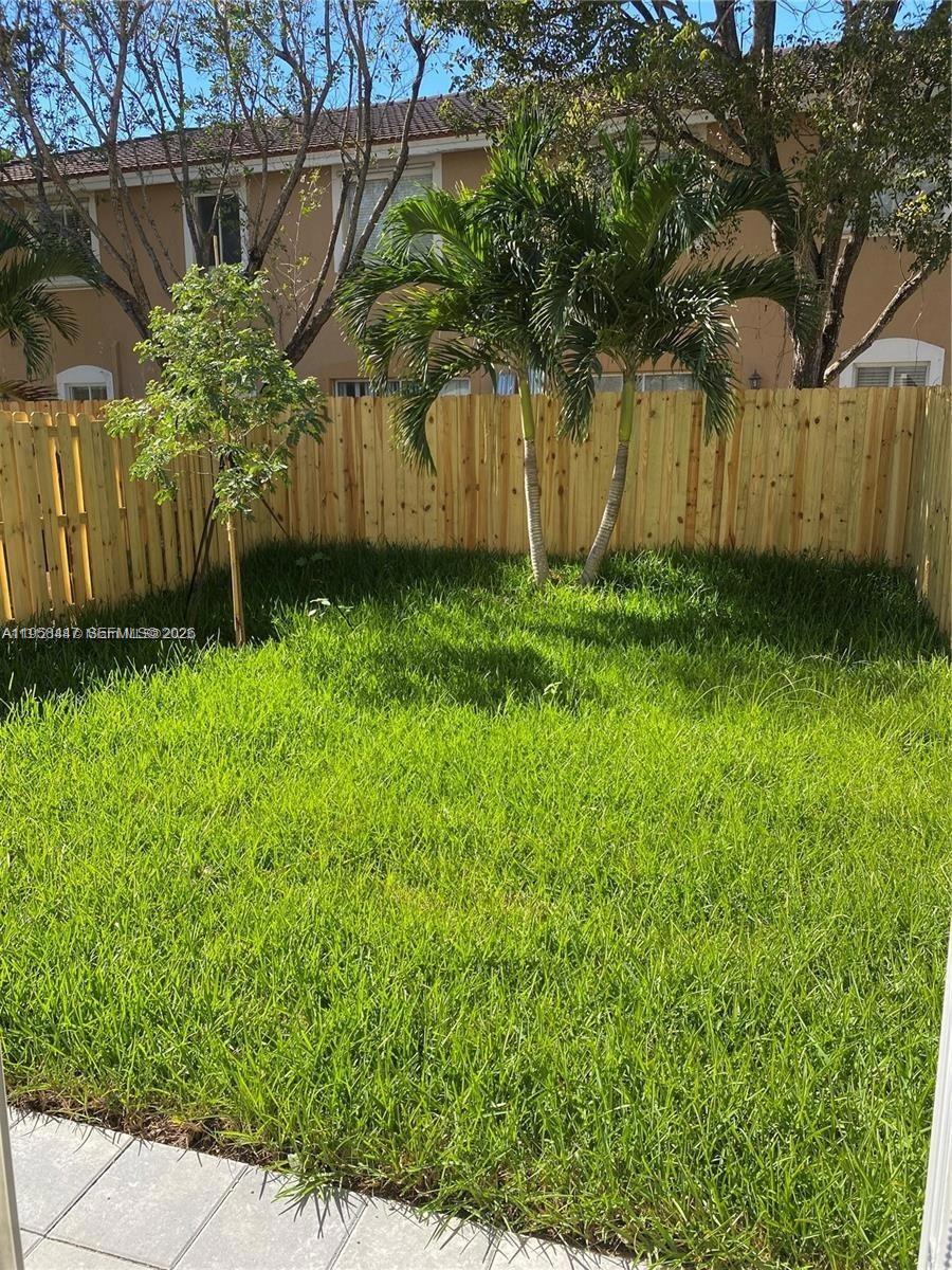 1070 Southeast 26th Street Homestead, FL 33035 - Photo 12 of 21 a view of a backyard