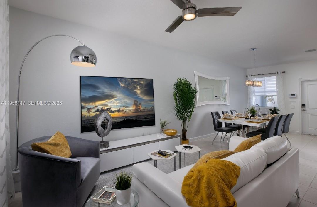 1070 Southeast 26th Street Homestead, FL 33035 - Photo 17 of 21 a living room with furniture and a flat screen tv