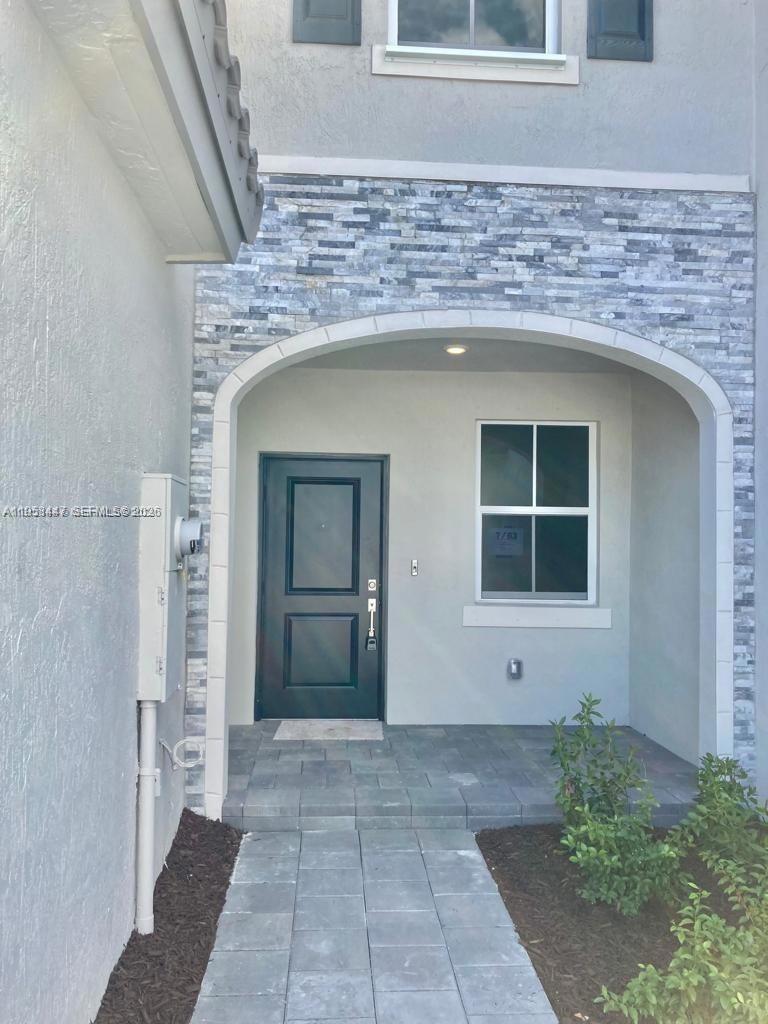 1070 Southeast 26th Street Homestead, FL 33035 - Photo 2 of 21 a view of an entryway door