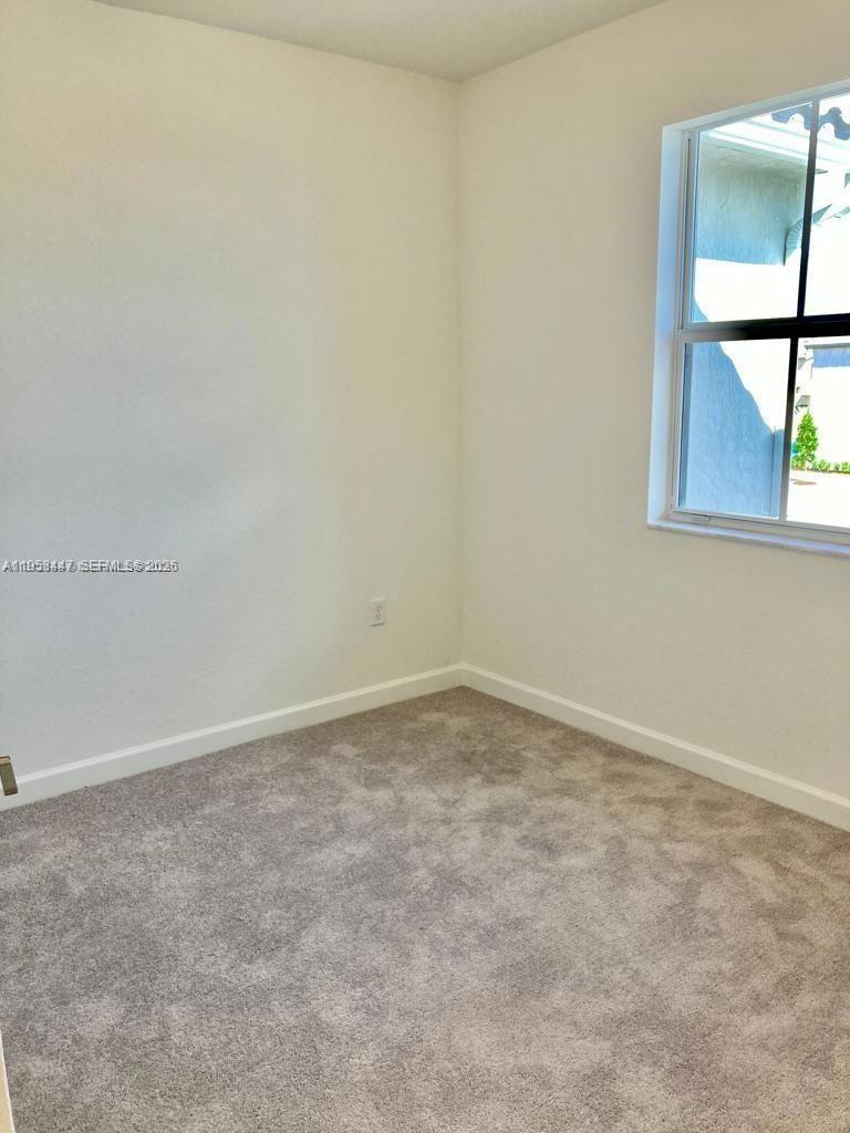 1070 Southeast 26th Street Homestead, FL 33035 - Photo 6 of 21 a view of an empty room