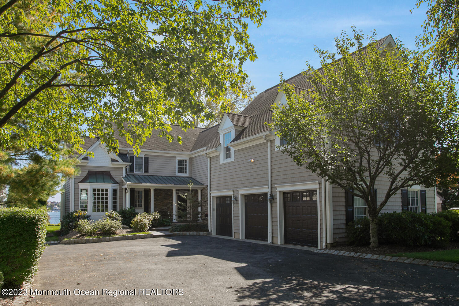 146 Conover Lane Red Bank, NJ 07701 - Photo 1 of 44 a front view of a house with a tree