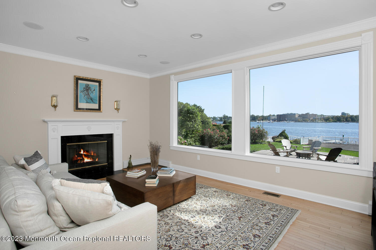 146 Conover Lane Red Bank, NJ 07701 - Photo 15 of 44 a living room with furniture a fireplace and a floor to ceiling window