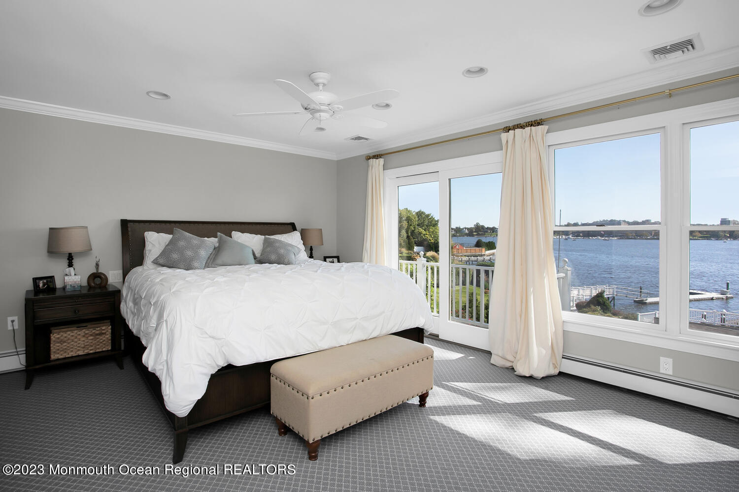146 Conover Lane Red Bank, NJ 07701 - Photo 20 of 44 a spacious bedroom with a bed and a large window