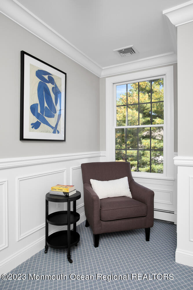 146 Conover Lane Red Bank, NJ 07701 - Photo 29 of 44 a bedroom with a bed a couch and a window