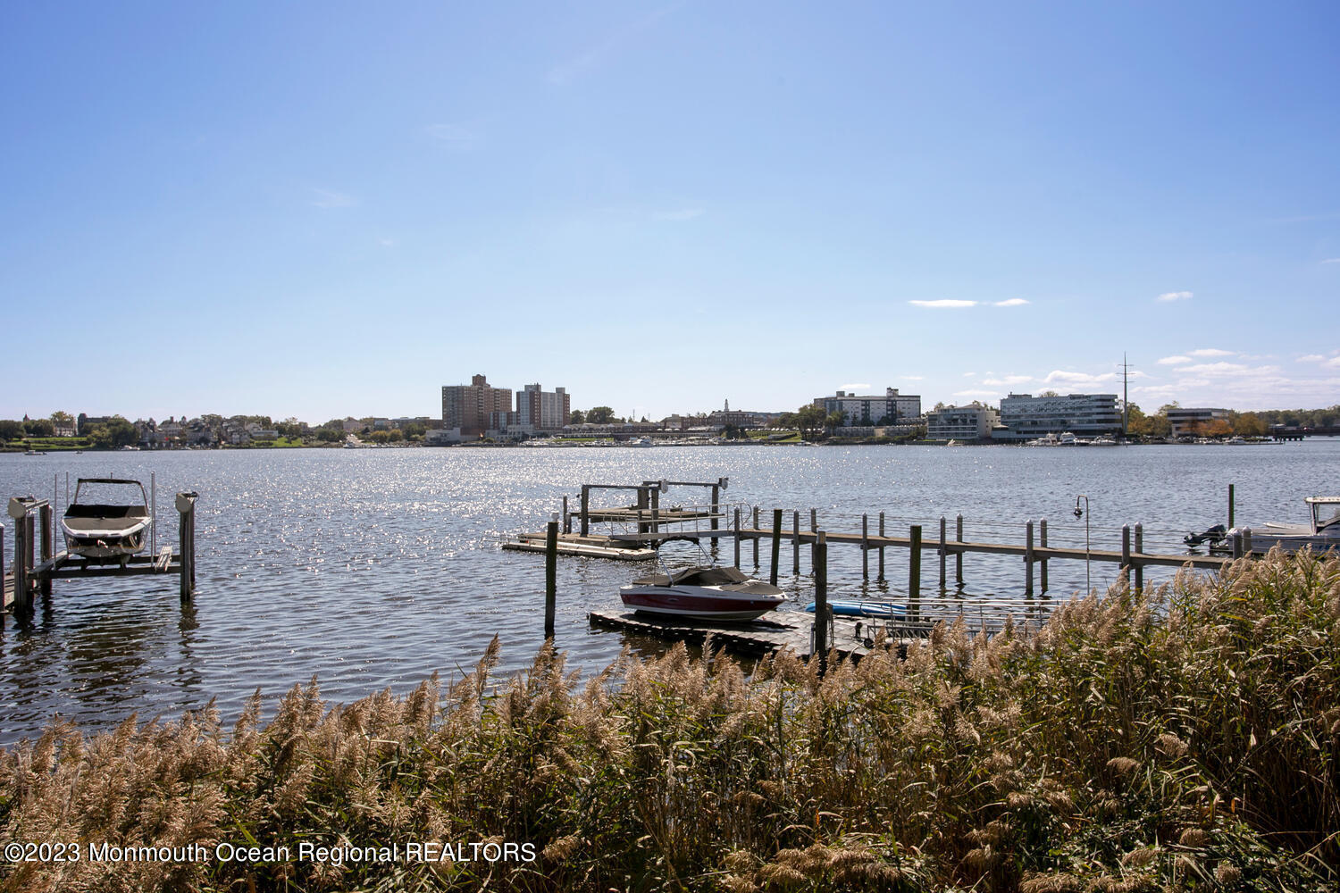 146 Conover Lane Red Bank, NJ 07701 - Photo 3 of 44 a view of a lake with houses in front of it