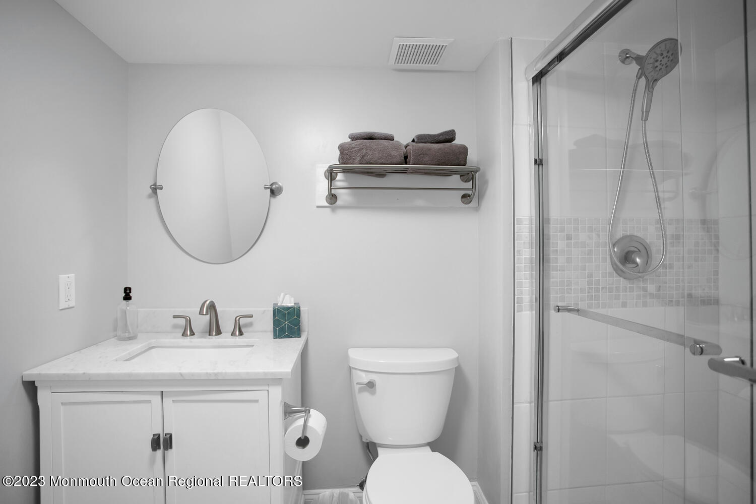 146 Conover Lane Red Bank, NJ 07701 - Photo 33 of 44 a bathroom with a toilet a sink and a mirror