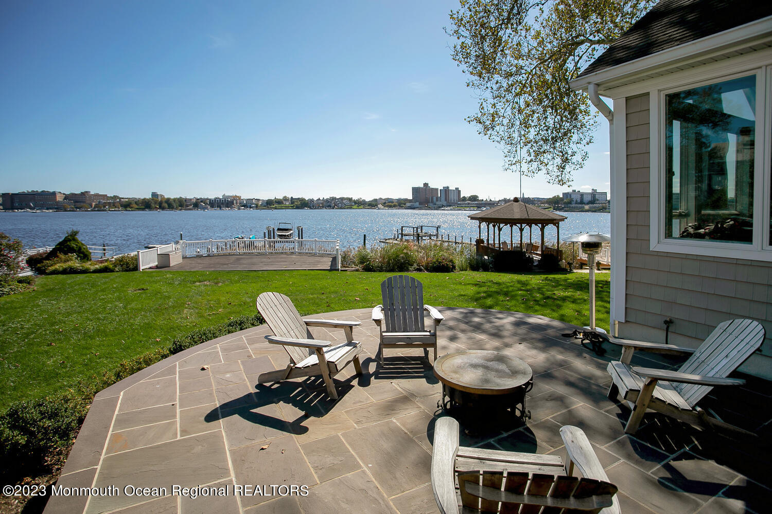 146 Conover Lane Red Bank, NJ 07701 - Photo 36 of 44 a view of a backyard with sitting area and garden