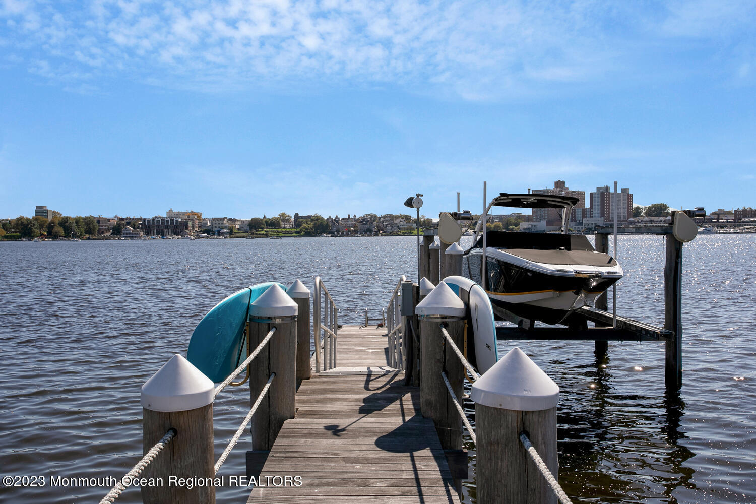 146 Conover Lane Red Bank, NJ 07701 - Photo 40 of 44 a view of a chairs in wooden deck