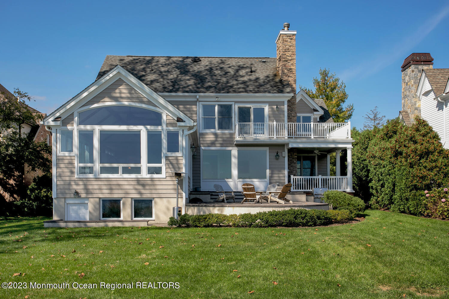 146 Conover Lane Red Bank, NJ 07701 - Photo 5 of 44 a front view of a house with a garden and plants