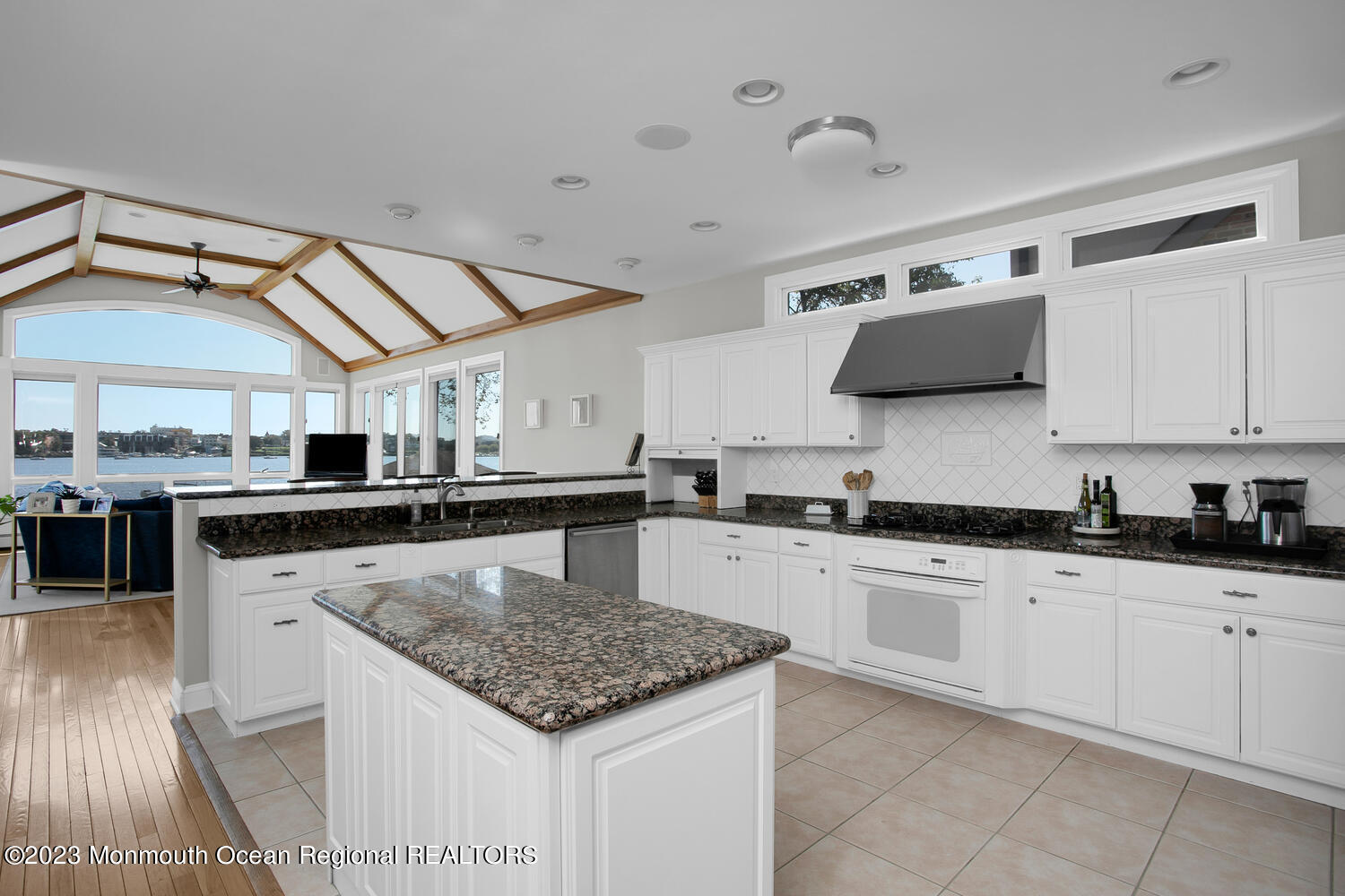 146 Conover Lane Red Bank, NJ 07701 - Photo 9 of 44 a kitchen with stainless steel appliances granite countertop a sink and dishwasher a stove with wooden floor