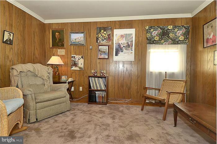 7700 Groton Road Bethesda, MD 20817 - Photo 14 of 30 a living room with furniture and a window