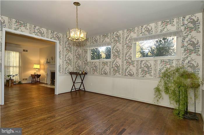 7700 Groton Road Bethesda, MD 20817 - Photo 7 of 30 a view of a living room and chandelier
