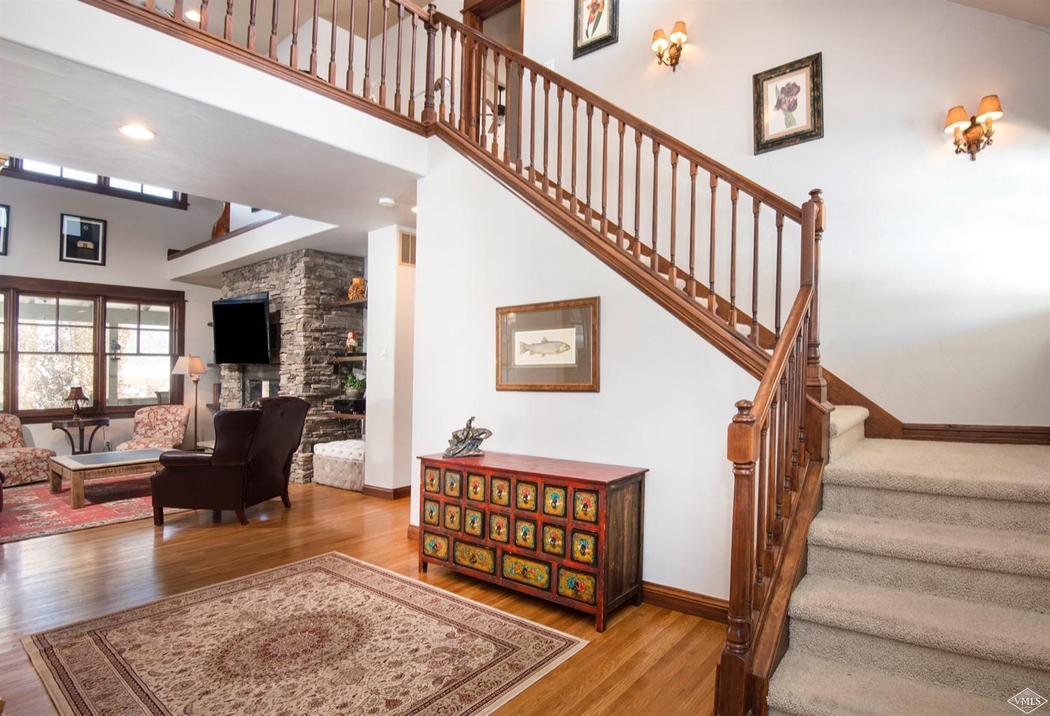 83 Newquist Street Eagle, CO 81631 - Photo 11 of 25 a view of entryway livingroom and hall with wooden floor