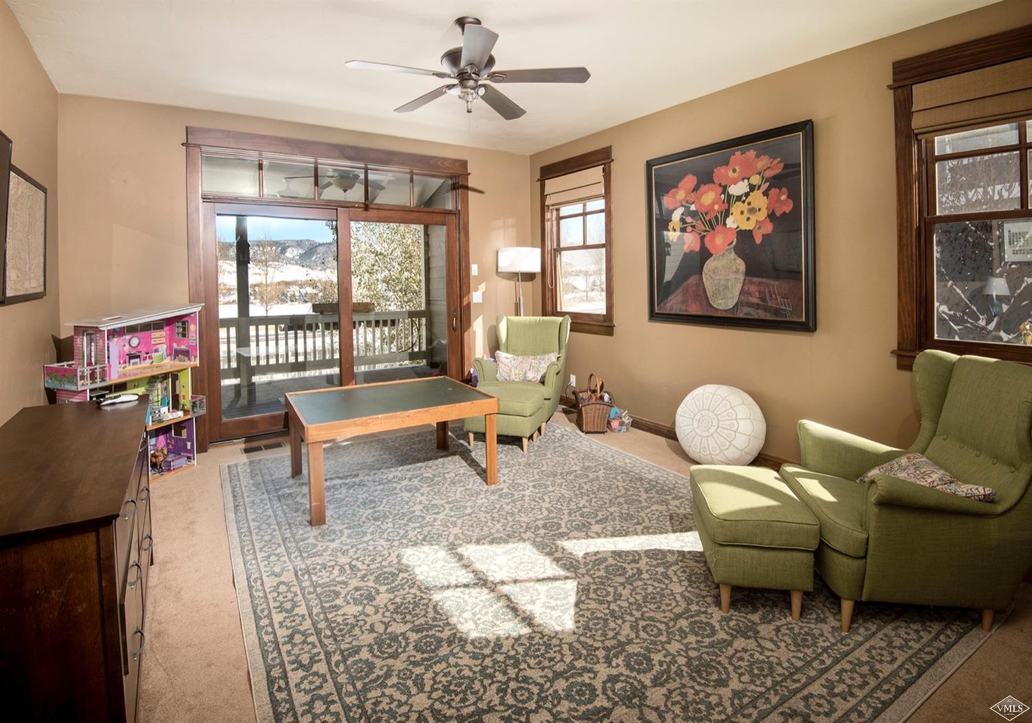 83 Newquist Street Eagle, CO 81631 - Photo 14 of 25 a living room with furniture a rug and a window