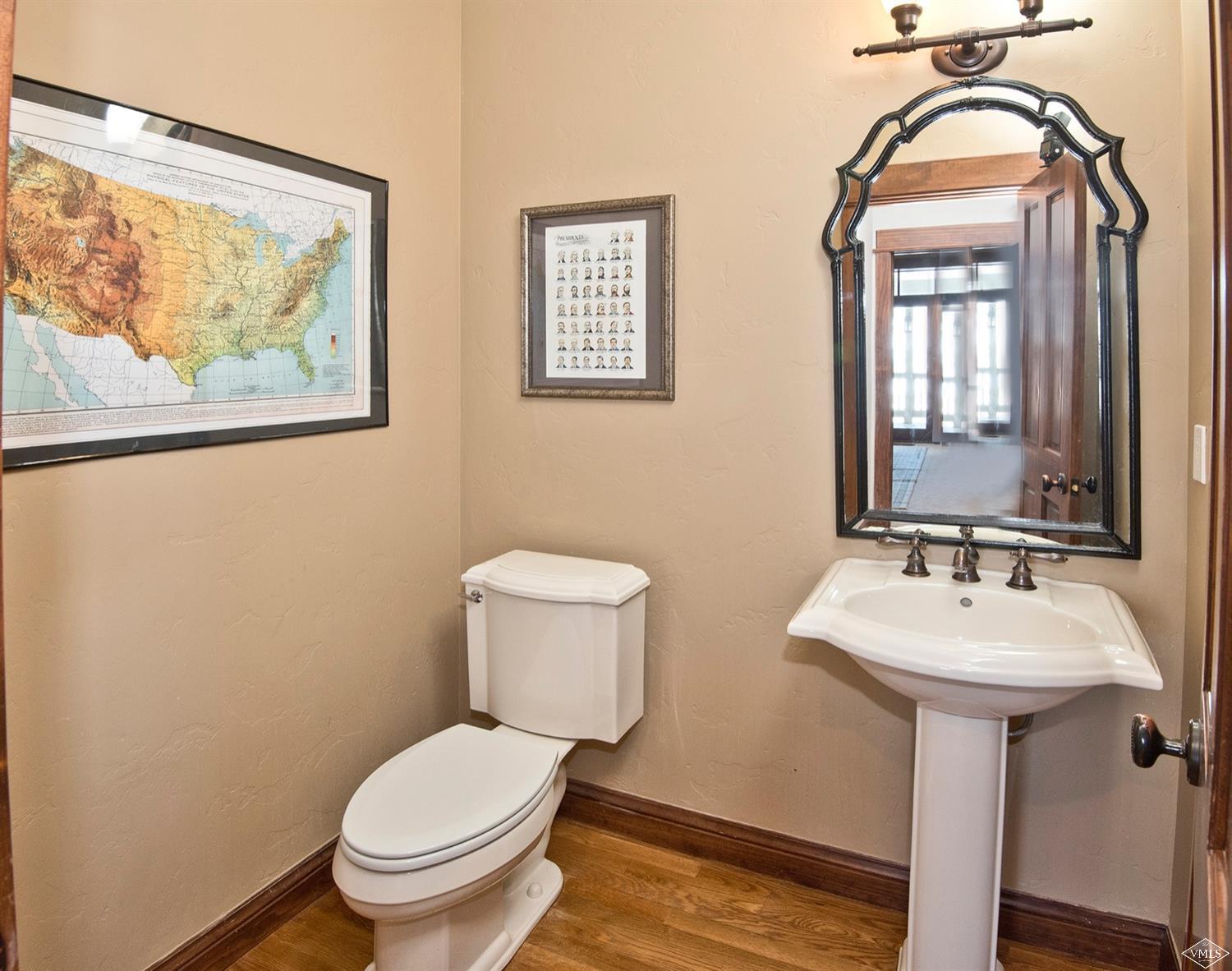 83 Newquist Street Eagle, CO 81631 - Photo 17 of 25 a bathroom with a toilet sink and mirror