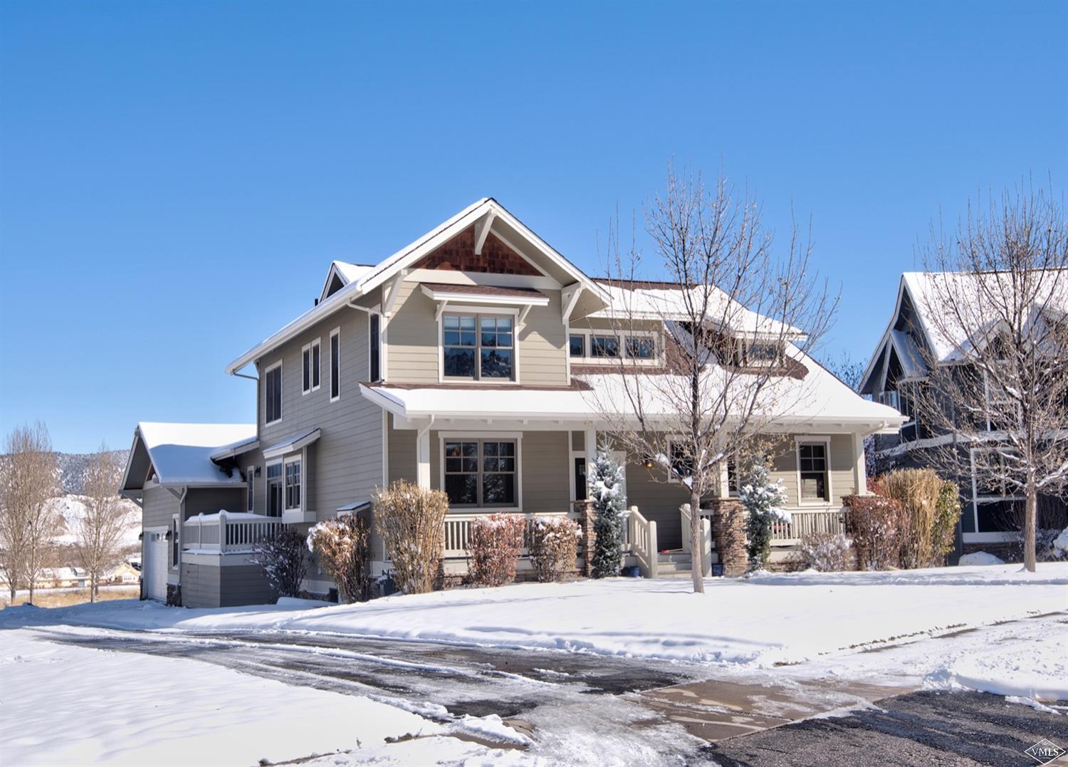 83 Newquist Street Eagle, CO 81631 - Photo 2 of 25 a front view of a house with a yard