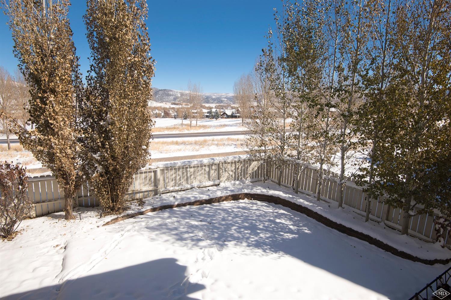 83 Newquist Street Eagle, CO 81631 - Photo 25 of 25 a view of a yard with a tree
