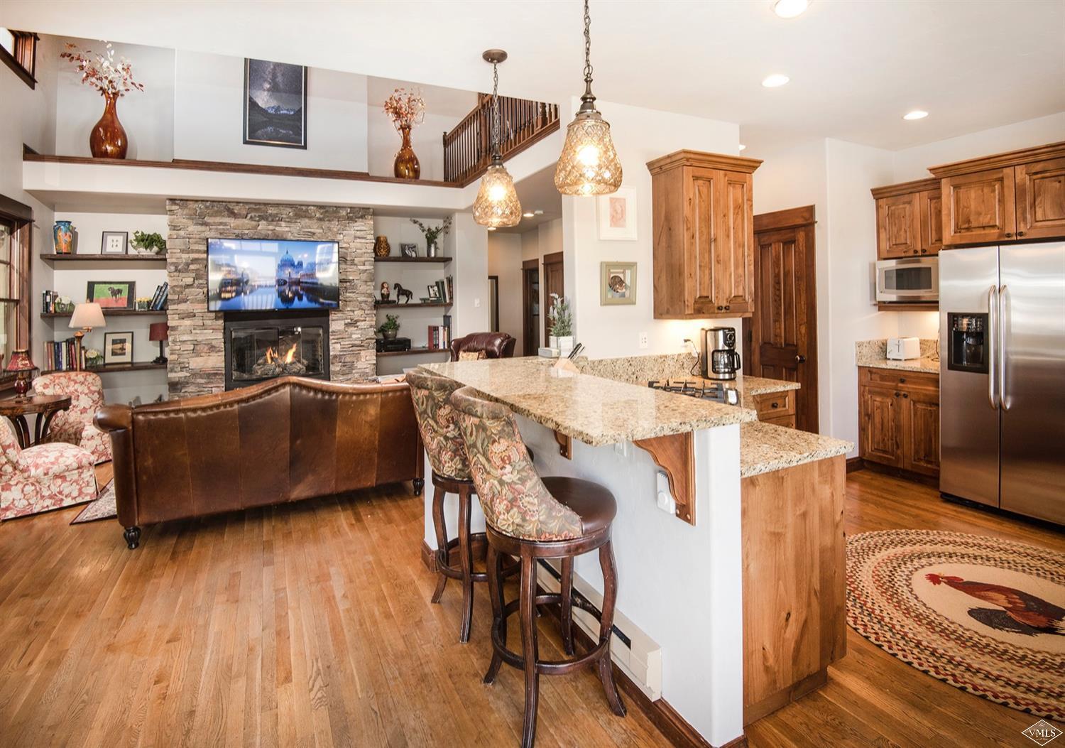 83 Newquist Street Eagle, CO 81631 - Photo 5 of 25 a view of a dining room with furniture window and wooden floor