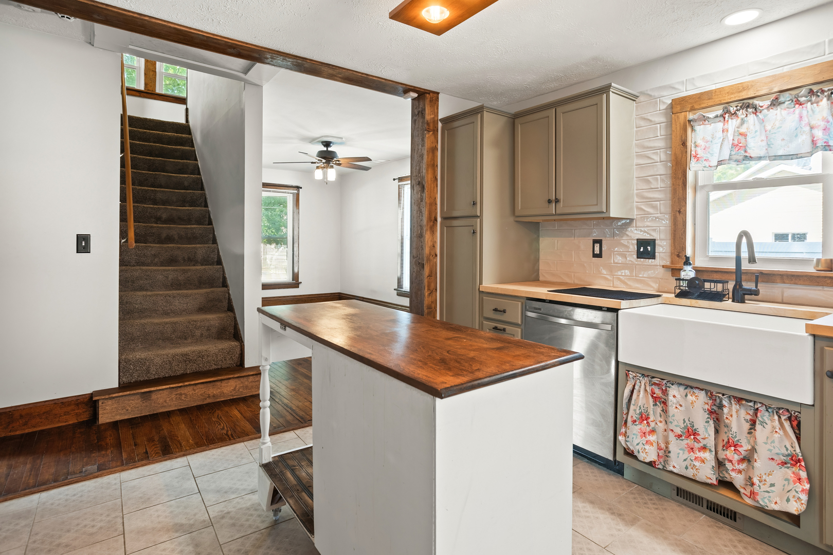 702 North Walnut Street Normal, IL 61761 - Photo 15 of 45 a kitchen with stainless steel appliances granite countertop a sink stove and cabinets
