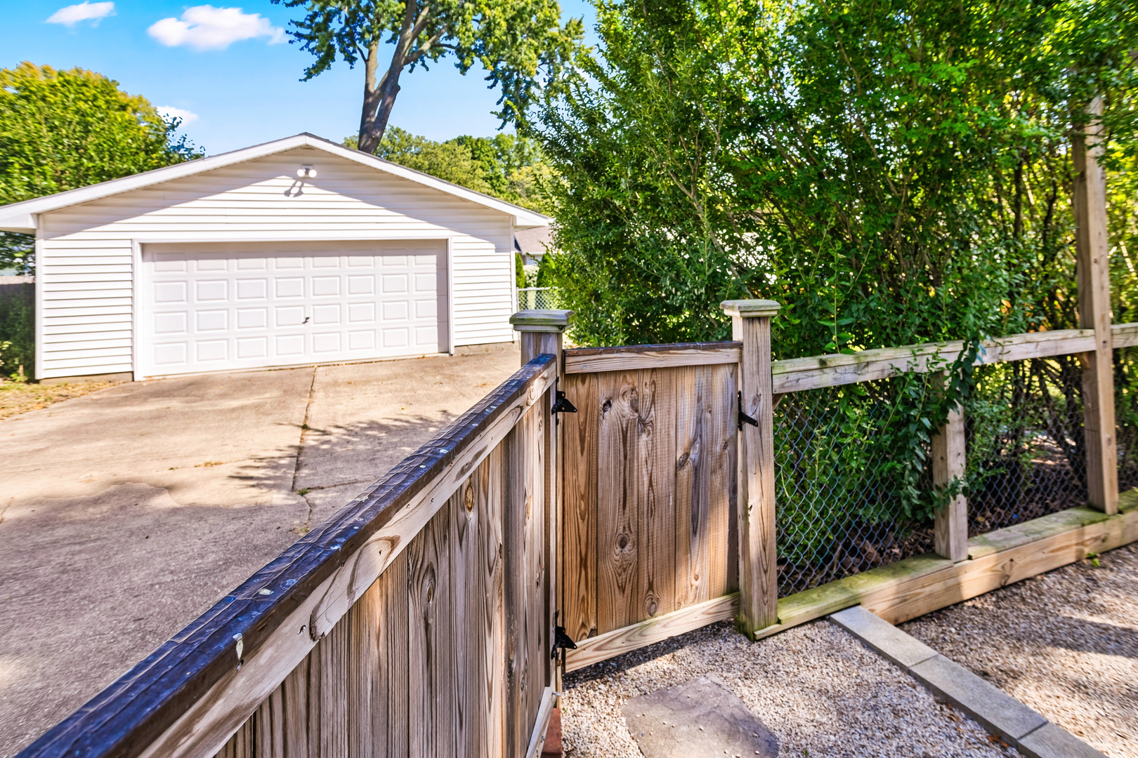 702 North Walnut Street Normal, IL 61761 - Photo 31 of 45 a view of a wooden deck and a yard