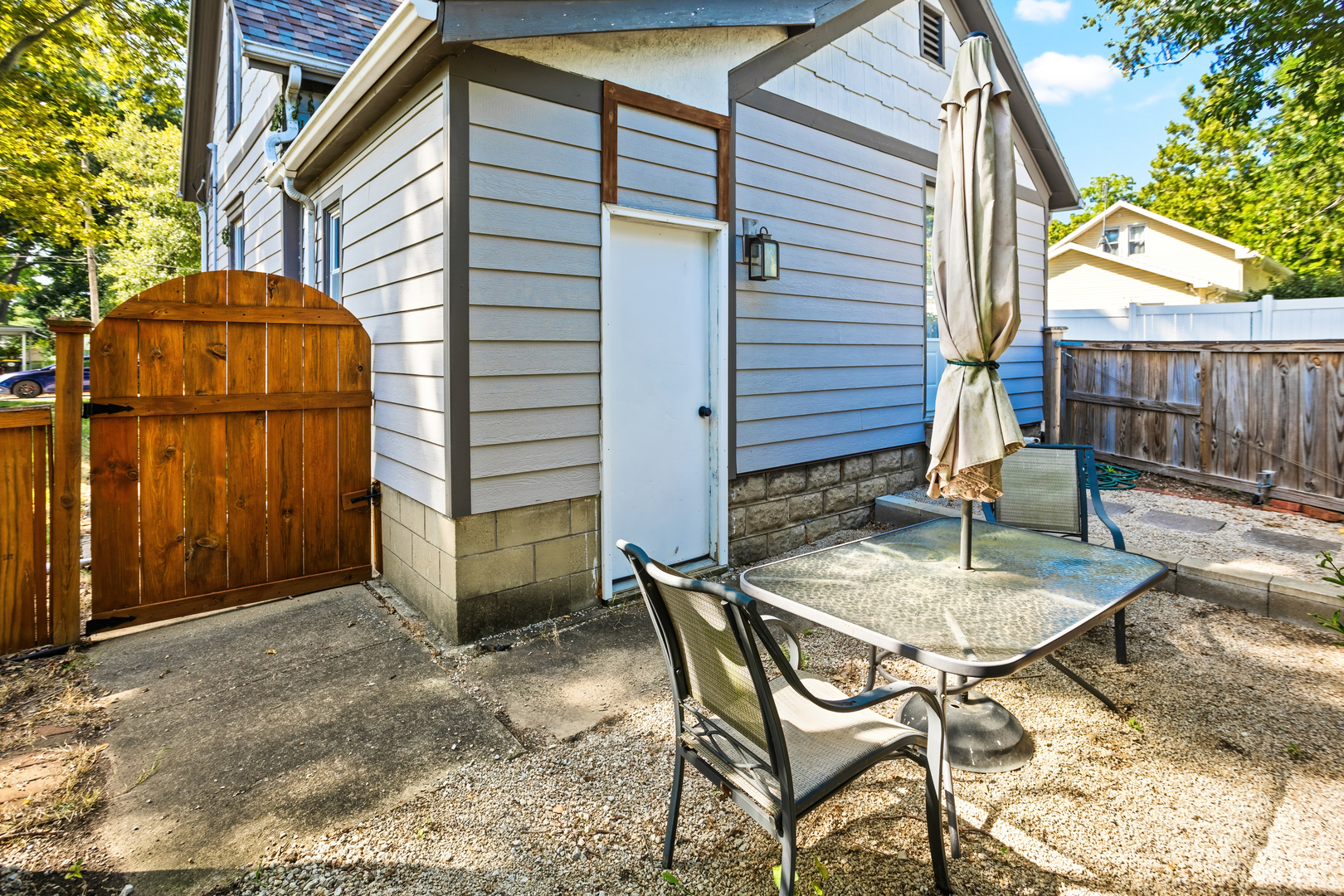 702 North Walnut Street Normal, IL 61761 - Photo 35 of 45 a backyard of a house with yard and outdoor seating