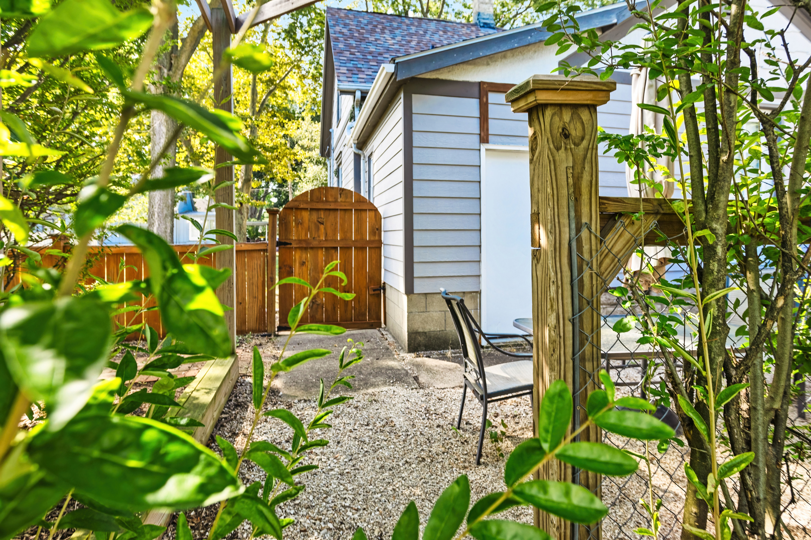 702 North Walnut Street Normal, IL 61761 - Photo 36 of 45 a backyard of a house with table and chairs