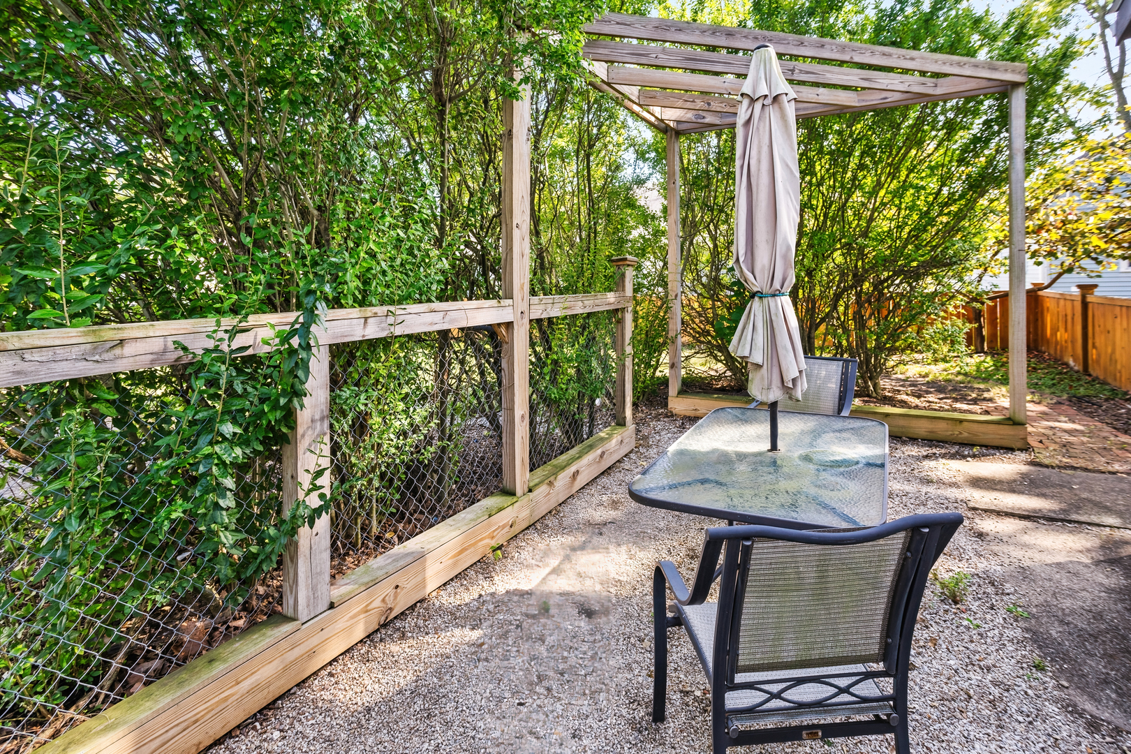 702 North Walnut Street Normal, IL 61761 - Photo 37 of 45 a view of a porch with furniture and wooden floor