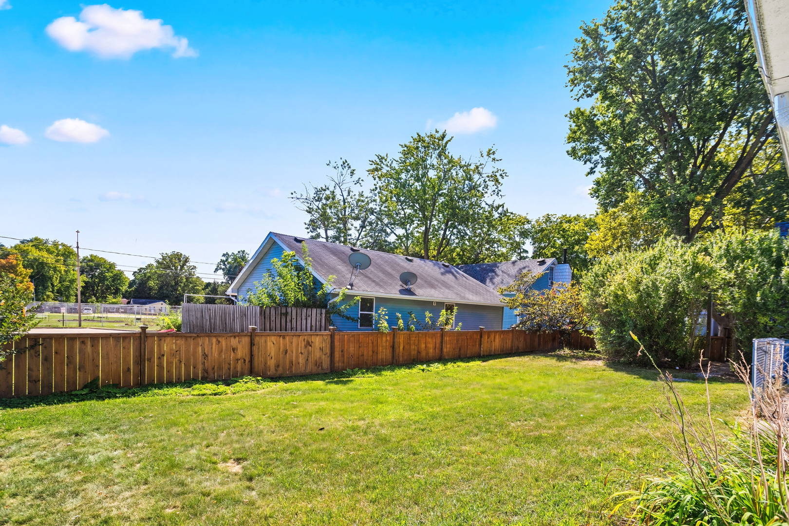 702 North Walnut Street Normal, IL 61761 - Photo 40 of 45 a view of backyard with wooden fence