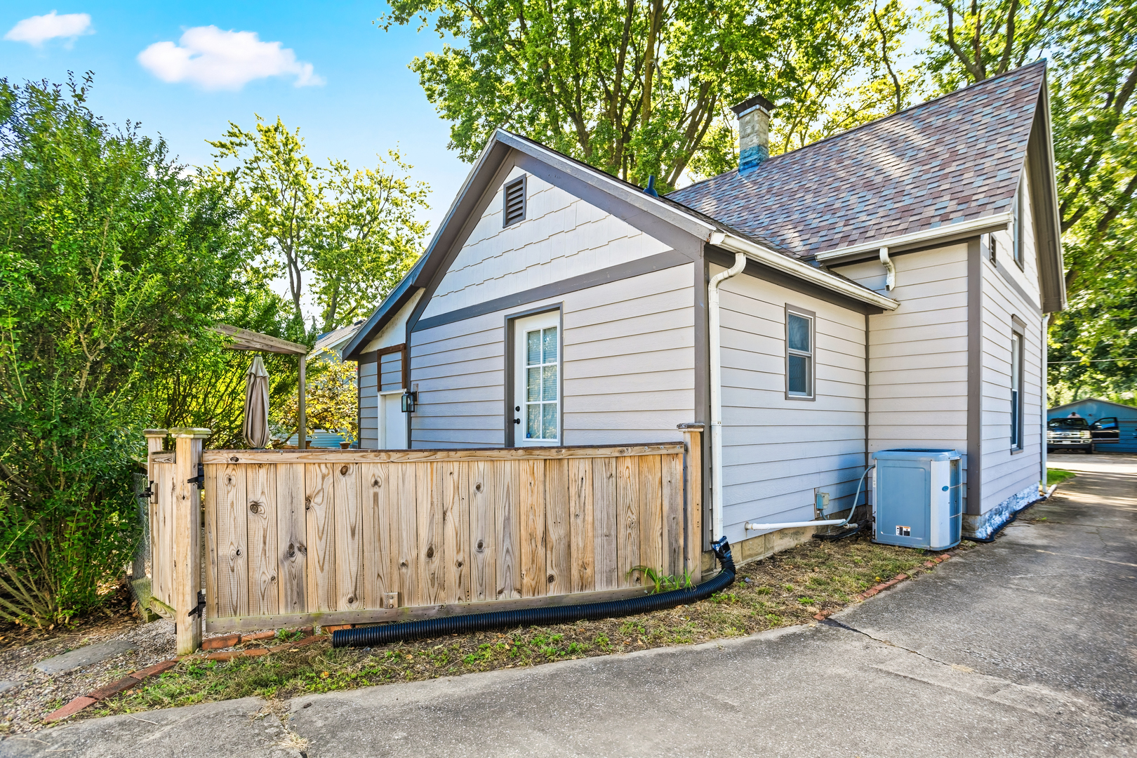 702 North Walnut Street Normal, IL 61761 - Photo 41 of 45 a view of a house with wooden fence