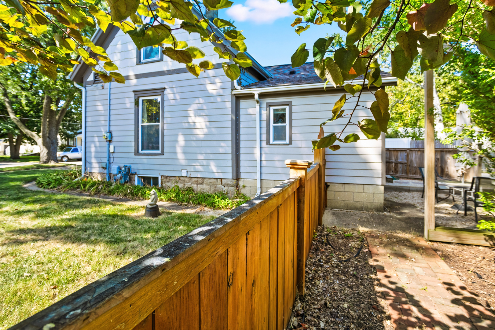 702 North Walnut Street Normal, IL 61761 - Photo 43 of 45 a view of a house with backyard and tree