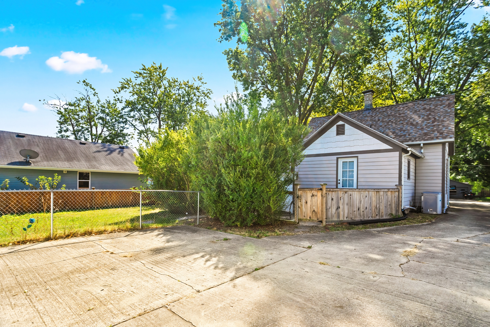 702 North Walnut Street Normal, IL 61761 - Photo 44 of 45 a view of a house with a yard and large tree