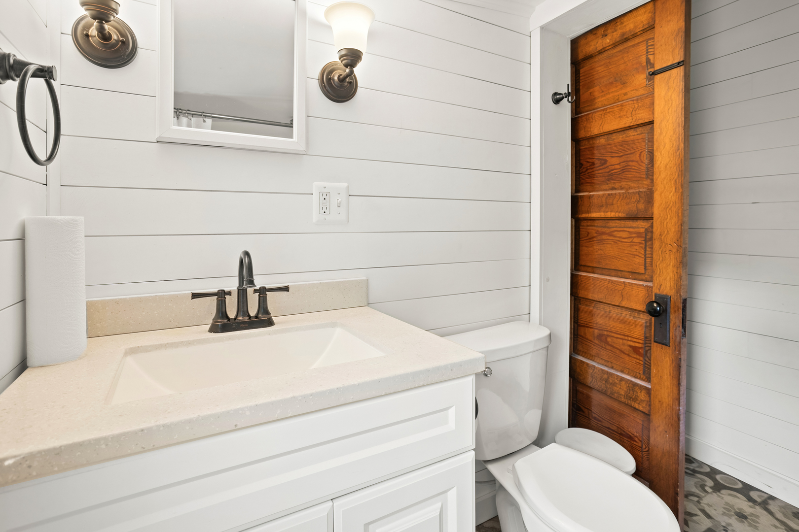 702 North Walnut Street Normal, IL 61761 - Photo 5 of 45 a bathroom with a sink toilet and shower