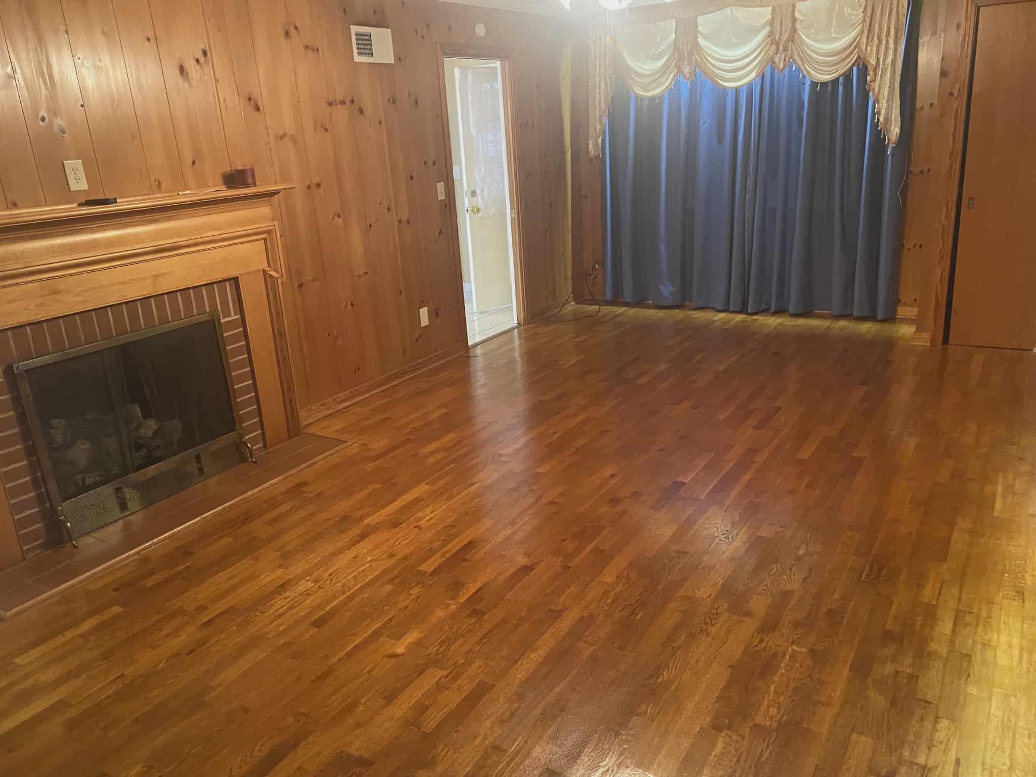 175 Austin Street Savannah, TN 38372 - Photo 2 of 33 a view of a livingroom with wooden floor and a fireplace