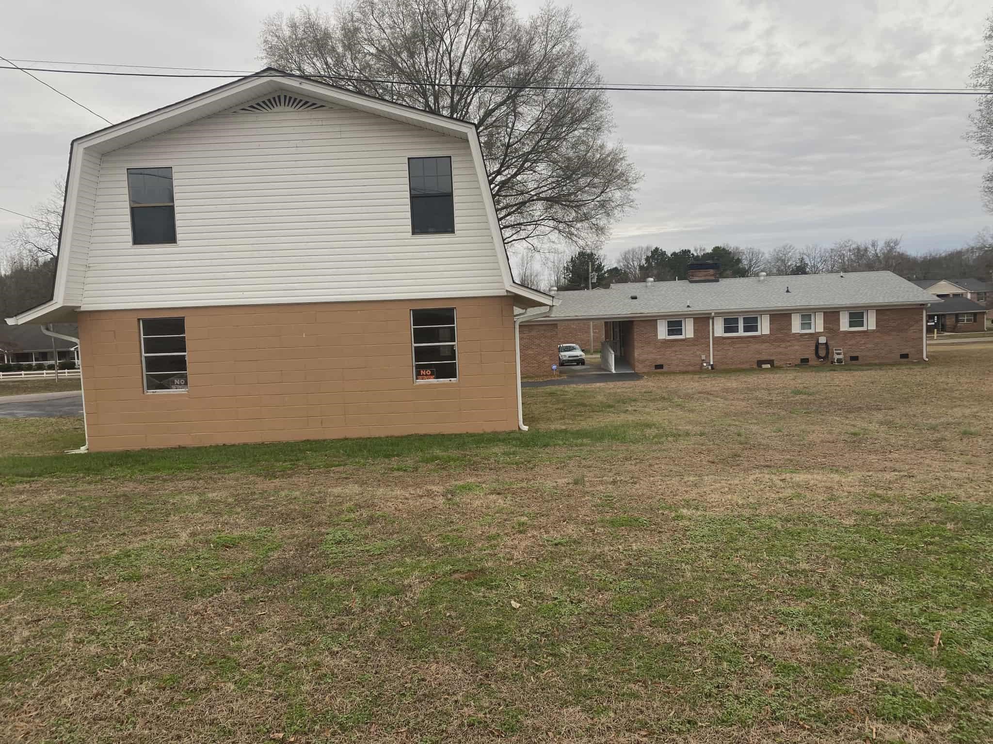 175 Austin Street Savannah, TN 38372 - Photo 24 of 33 a view of a house with a backyard