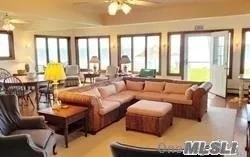 a bathroom with a toilet and a bathtub