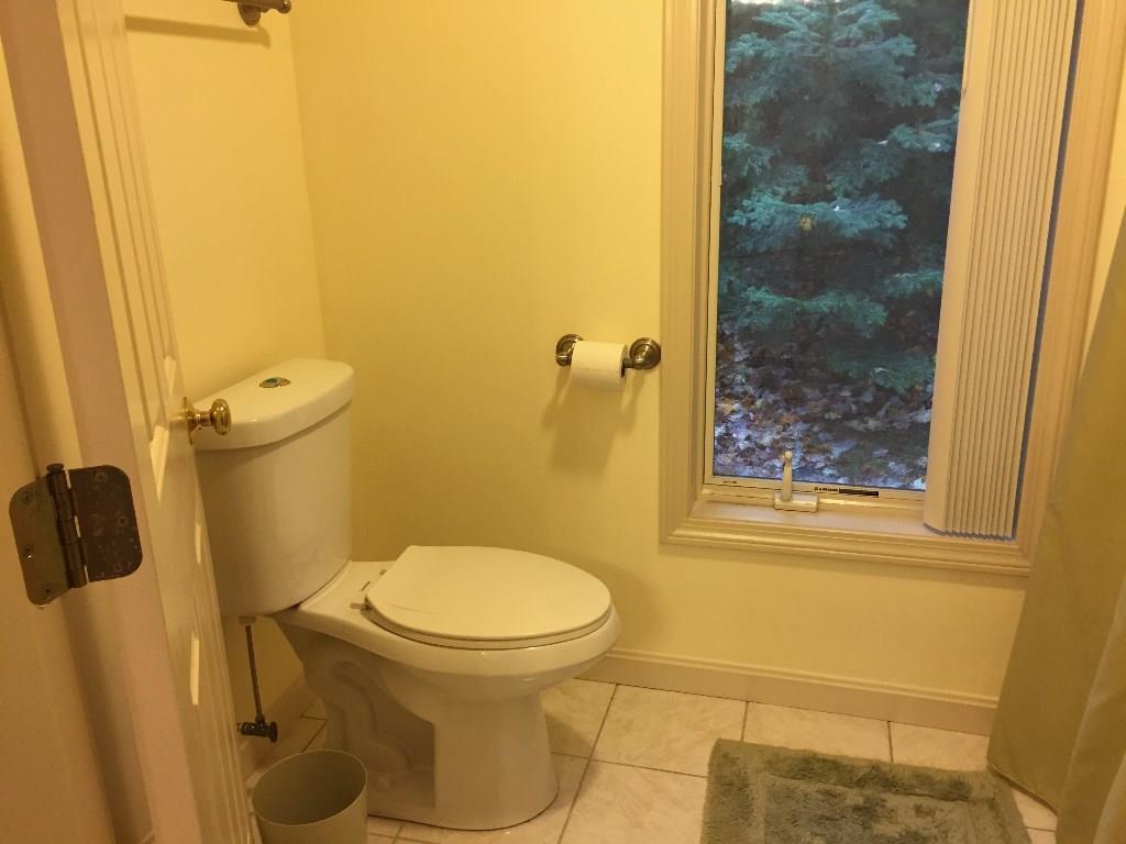 170 Kelleytown Road Bernard, ME 04612 - Photo 27 of 33 A privacy door to the shower and commode