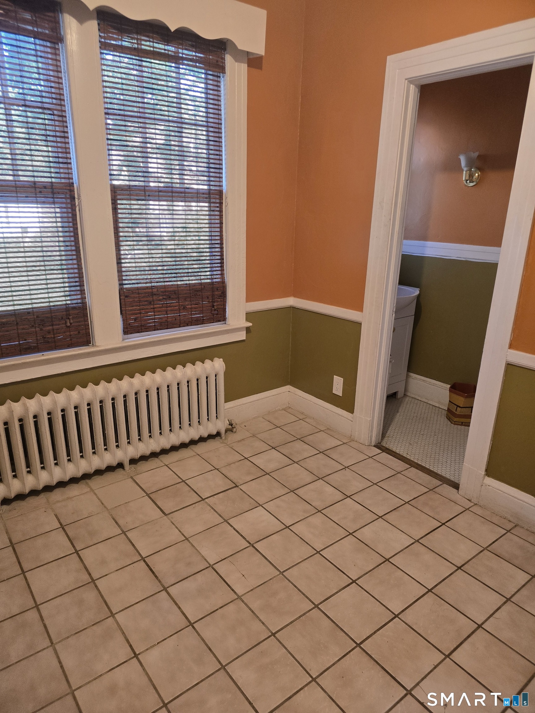 197 Ridgefield Street Hartford, CT 06112 - Photo 14 of 29 Sunny Breakfast Nook and Half bath