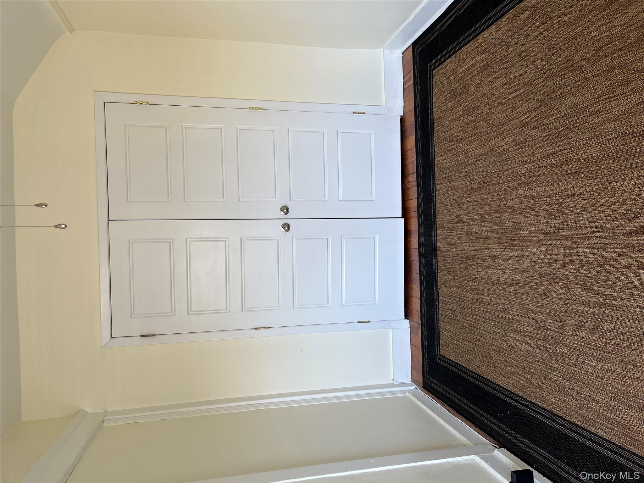 51 Parkway Road, Unit 3 Bronxville, NY 10708 - Photo 11 of 20 a view of an empty room with wooden floor